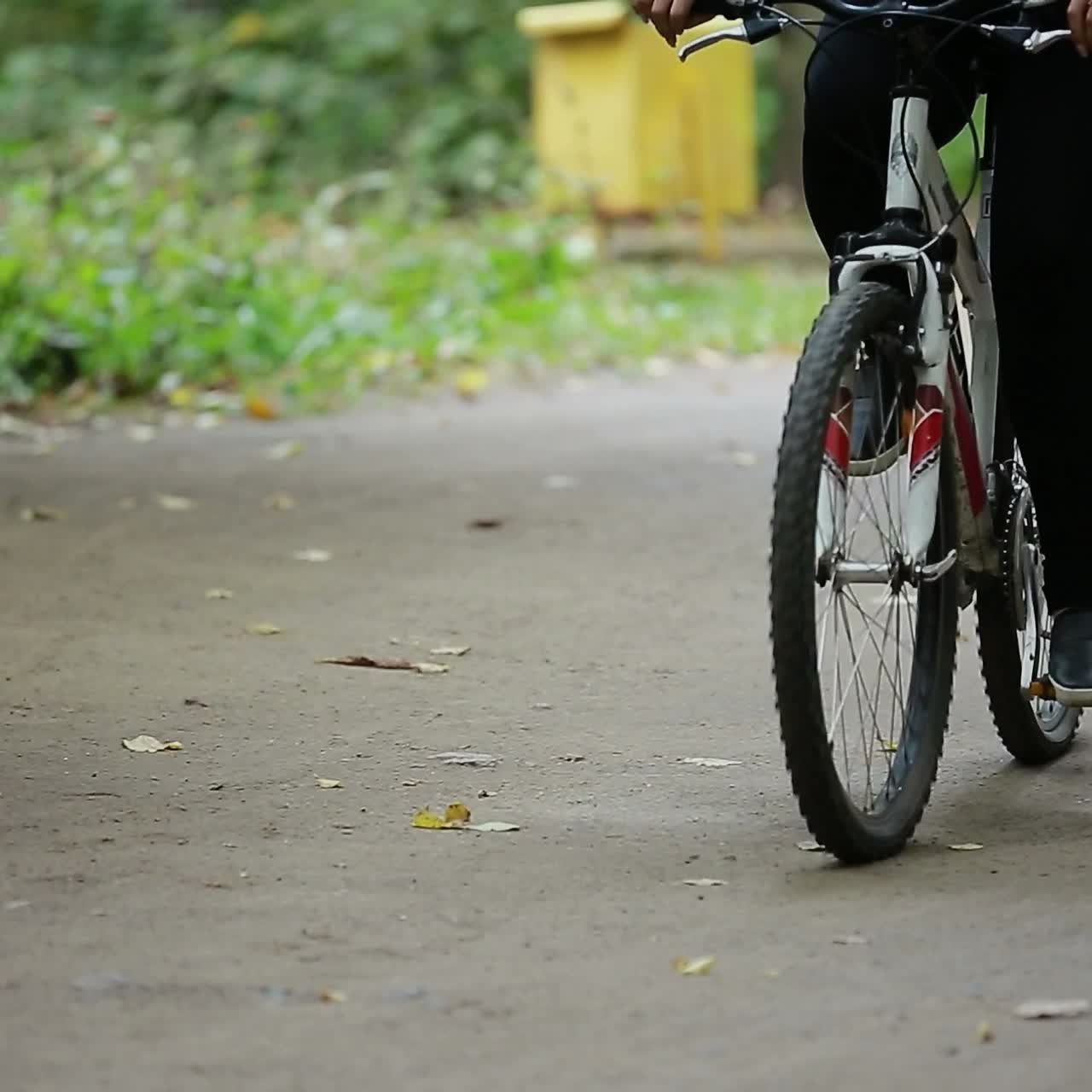 Couple Together Ride A Bicycle