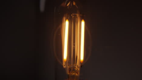 electric glow, close-up bulb switching off