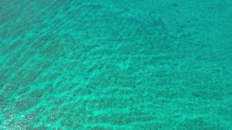 aerial top down view from high altitude of blue turquoise sea water texture