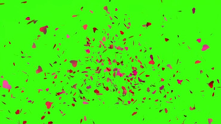 4k Heart Confetti explosion on green screen. Falling red hearts particles. Valentines day wallpaper. Isolated on green screen background.