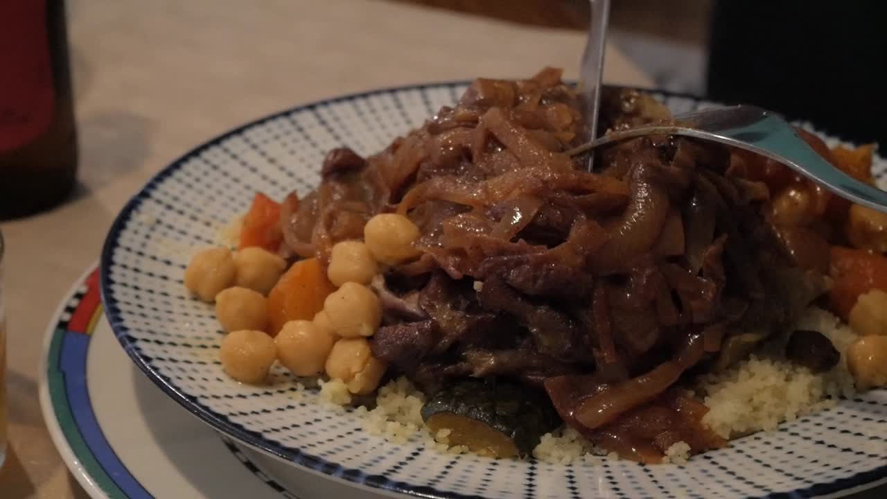 Close-up of a succulent couscous with meat, vegetables and chickpeas