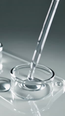 pipetting liquid into a petri dish