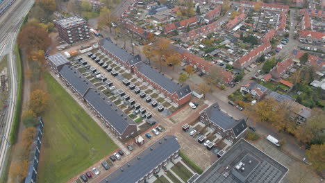 Aerial-of-rooftops-filled-with-solar-panels-in-a-new-suburban-neighborhood