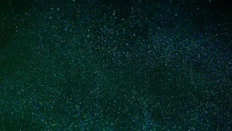 abstract background with shining bokeh sparkles.