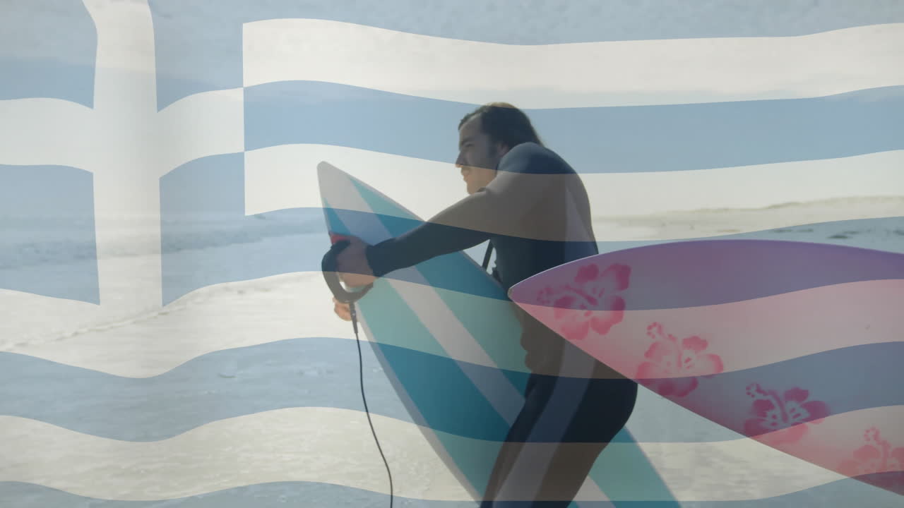 Carrying surfboard, man walking on beach with Greek flag animation overlay