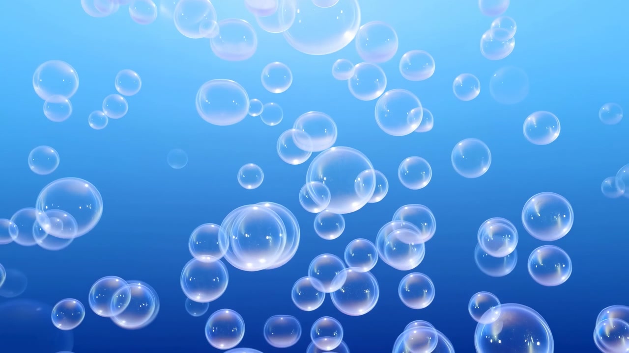 Small air bubbles ascend through clear blue water, creating a tranquil underwater tableau with soft light and gentle motion