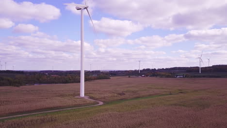 aerial view of wind turbine creating green and renewable energy