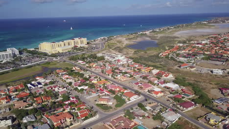 pan and tilt up from a residential neighbourhood in aruba to the north end of the island