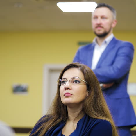 beautiful woman sitting and listening to the speaker in the business seminar. people at a conference or presentation