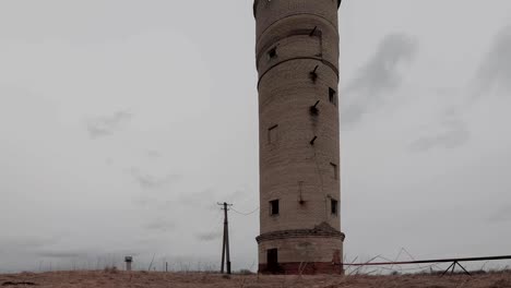 old abandoned brick water tower timelapse