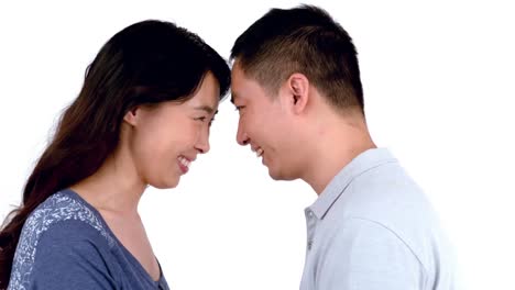 Happy-Asian-couple-looking-in-each-others-eyes