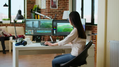 Female-filmmaker-working-on-post-production-from-home-office