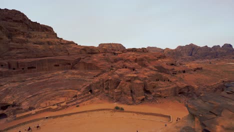 The-Roman-Theater-at-Petra,-historic-UNESCO-heritage-site-carved-into-sandstone-in-Jordan-close-to-Treasury-Khanznet-temple