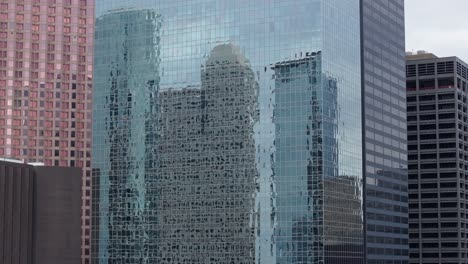 reflections on skyscrapers in downtown houston
