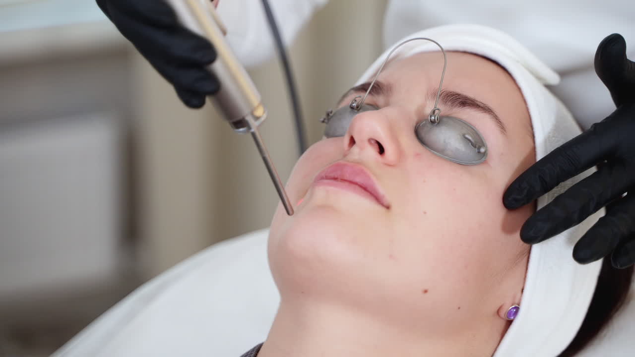 Woman Undergoing Laser Skin Treatment