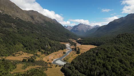 Beautiful-view-of-Greenstone-track-valley-and-river-surrounded-by-untouched-nature,-New-Zealand---aerial