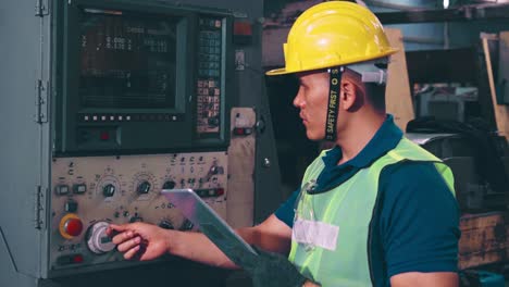 smart factory worker using machine in factory workshop