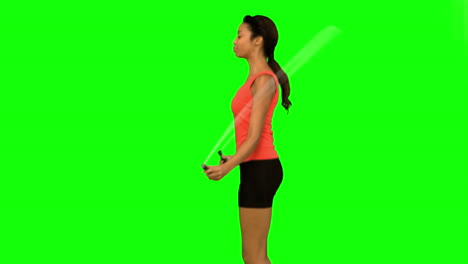 Pretty-woman-working-out-with-a-rope-on-green-screen