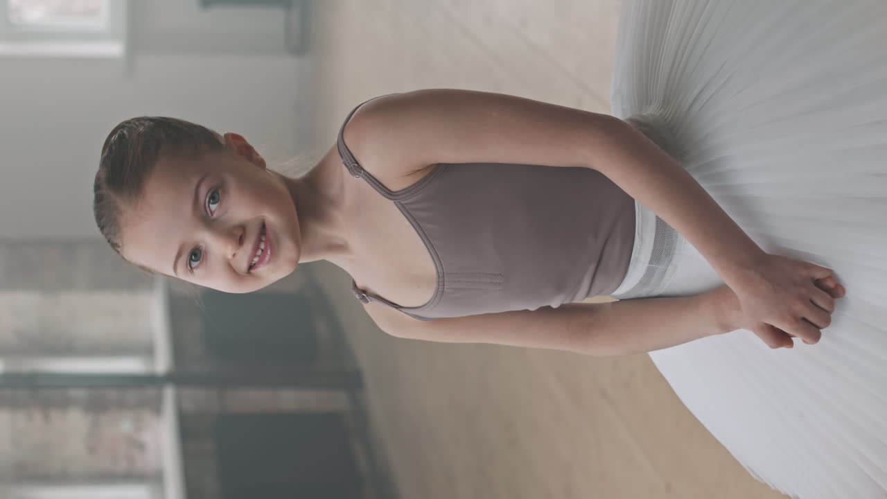 Vertical Portrait Of Smiling Little Ballerina