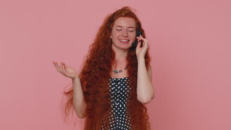 smiling redhead woman wears headset, freelance worker call center, support service operator helpline