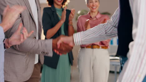 business handshake and team celebration
