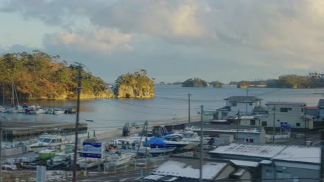 Matsushima-Bay-in-Winter,-View-from-Train-Passing-Winter-Landscape,-Japan