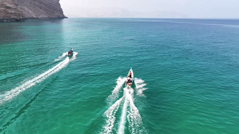 Aerial-Follow-Tourist-Boat-Sailing-Over-Shoab-Beach-On-Socotra-Island-In-Yemen