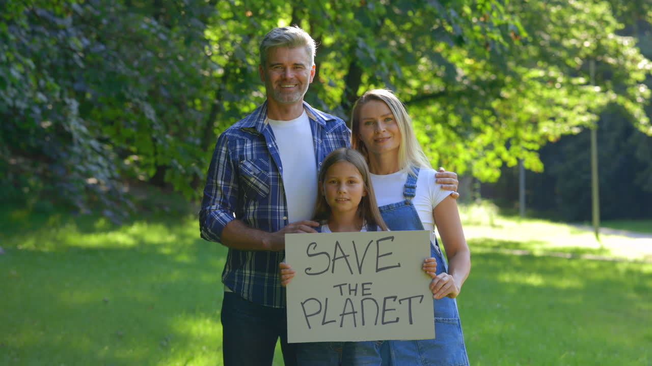 Family Protesting for Environmental Conservation