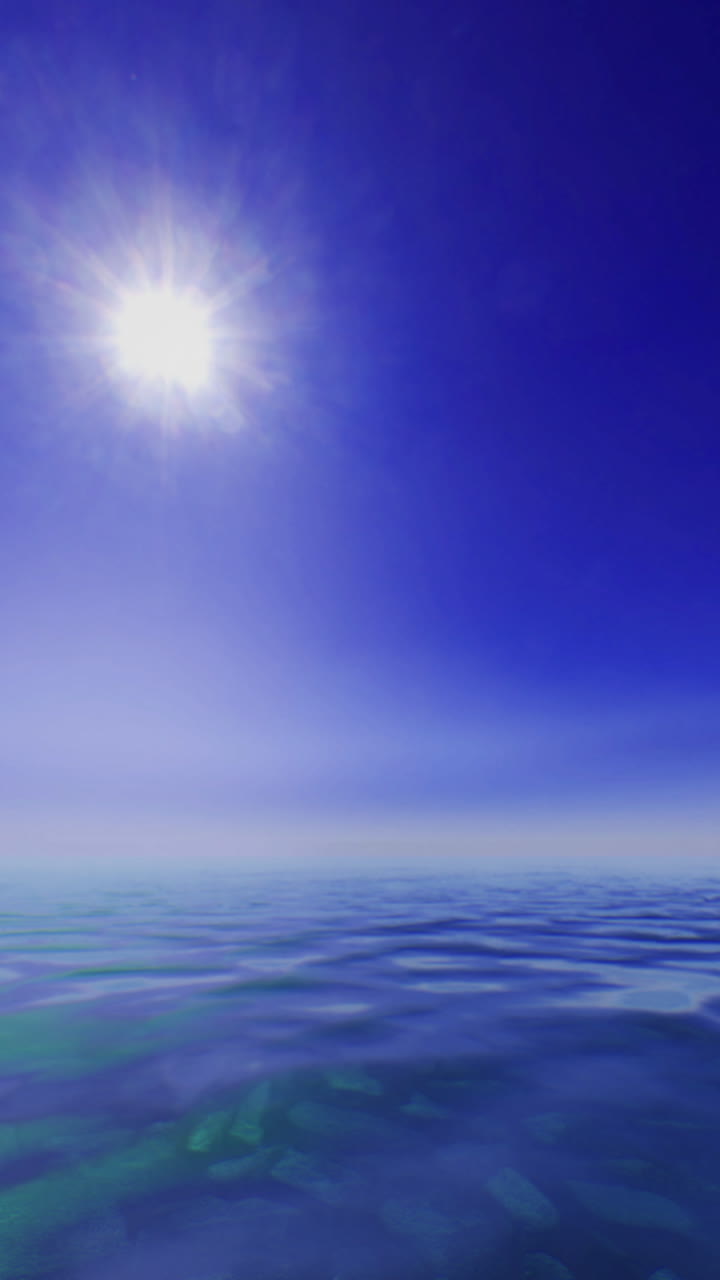 Vast blue ocean under a bright sun during a clear day
