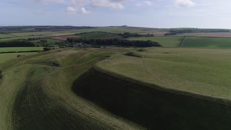 Aerial-of-the-eastern-gate-of-the-iron-age-hill-fort,-Maiden-Castle