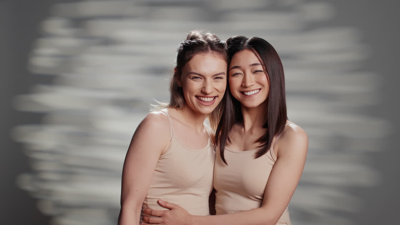 Two Women Smiling in Studio