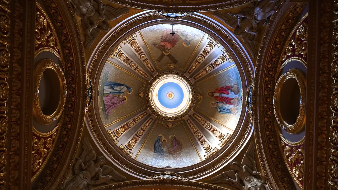 The interior beauty of St George’s in Gozo reveals golden tones, sacred artistry, and the elegance of baroque craftsmanship that defines Maltese devotion