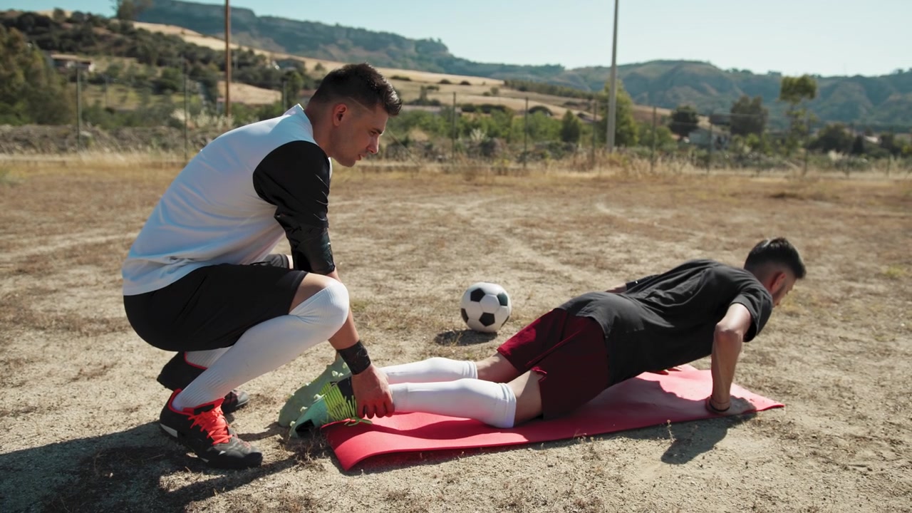 Two Teammates Training Together Before The Game