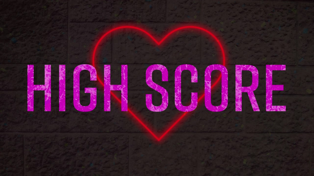 Neon Heart Sign Displaying High Score Text