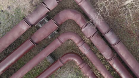 zooming out view of industrial piping, water pipes, cooling - boom shot