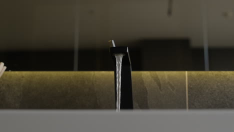 Modern Black Faucet with Water Flow