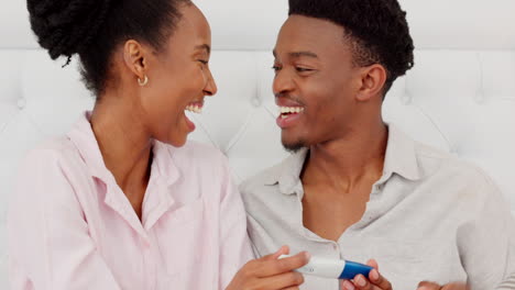 African-couple-reading-pregnancy-test