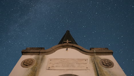 Astro-night-timelapse-doly-Low-angle-mountain-church-summer-Kaimaktsalan-Greece