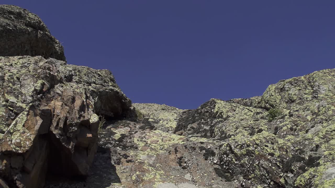 Steep rocky surfaces and clear blue skies. The vibrant landscape features rugged rocks and natural formations, perfect for climbing. Stara Planina next to the city of Sliven. Balkan Mountains