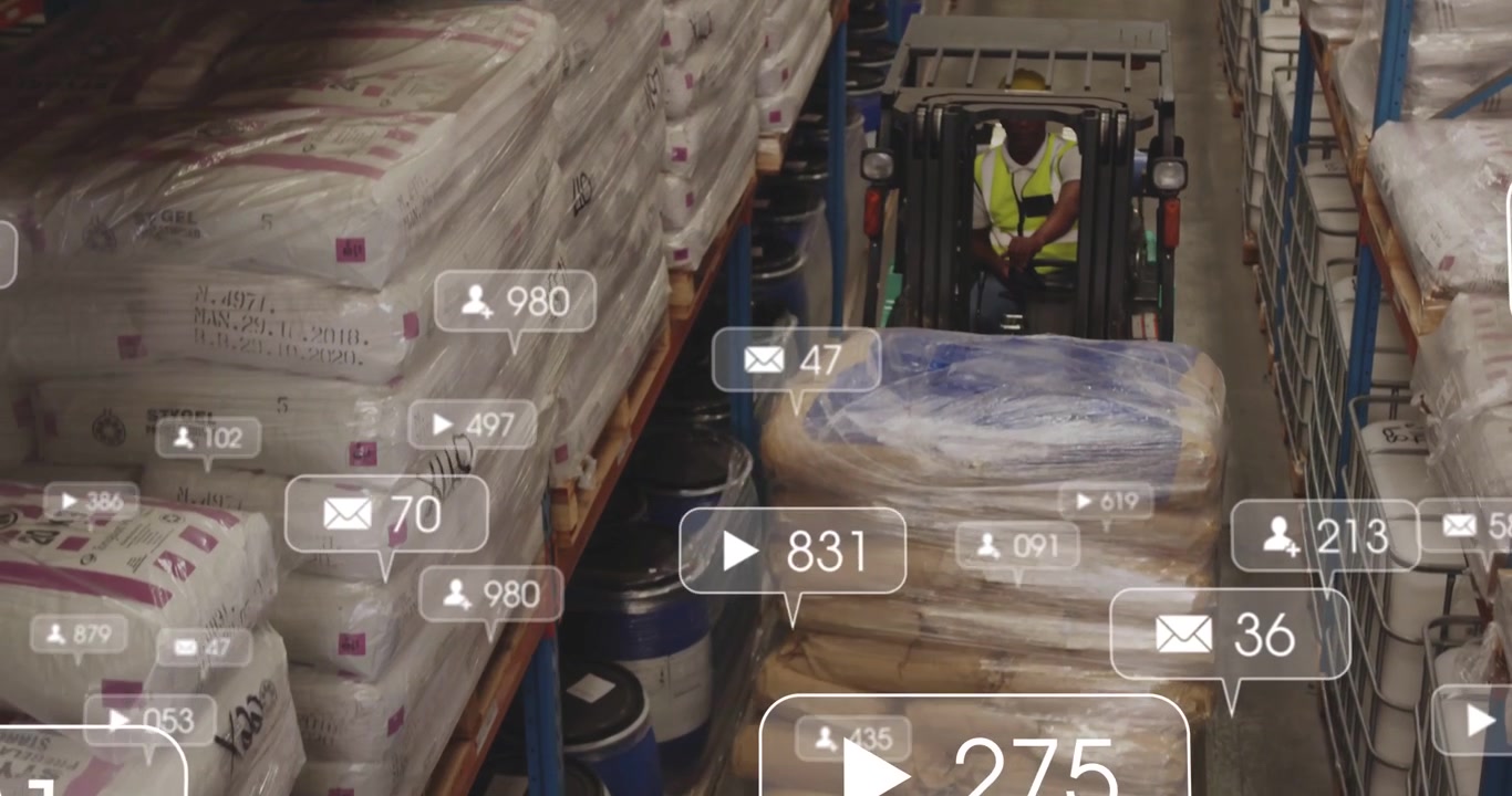 Logistics Worker Operating Forklift in Modern Warehouse with Data Overlay