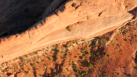 4K-aerial-of-rock-formations-in-a-desert-landscape---Arches-National-Park,-Utah,-USA