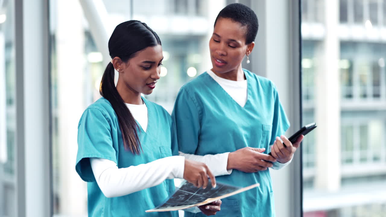 Woman, doctor and team walking with x ray scan