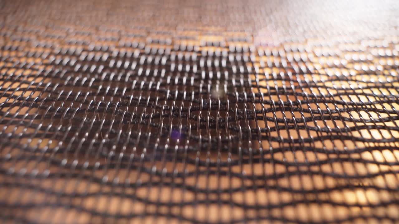 textura de fondo sin costuras de fibra de kevlar aramida. enfoque selectivo. silla de oficina