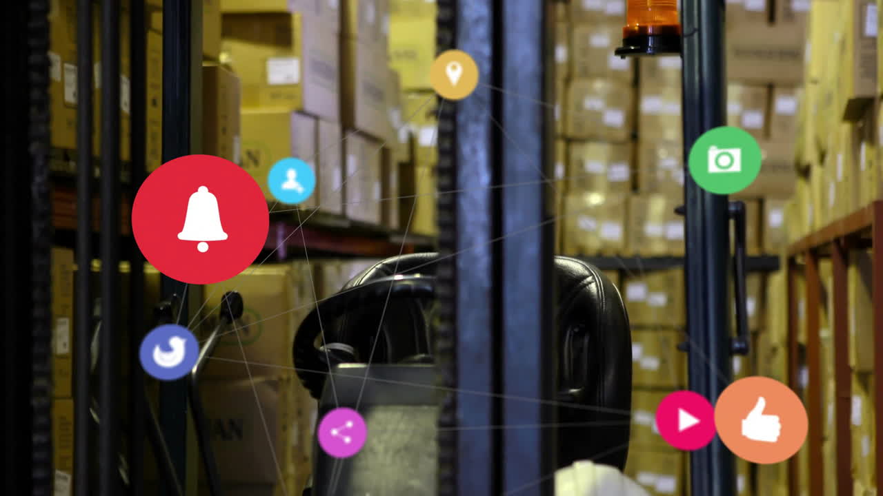 In warehouse, animation of social media icons overlaying shelves with stacked boxes