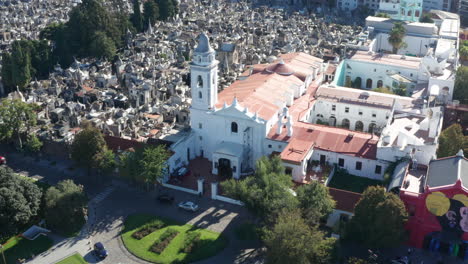 AERIAL---Recoleta-Cemetery,-Buenos-Aires,-Argentina,-wide-rising-reveal-shot