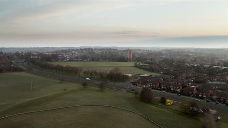 Aerial-Flyover-of-Chapeltown,-Leeds-at-Dawn-on-Sunny-Spring-Day
