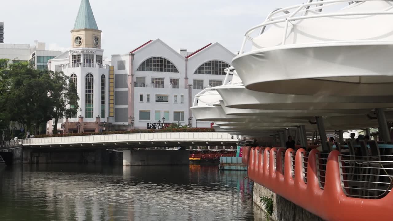Construction progress around a calm city river.