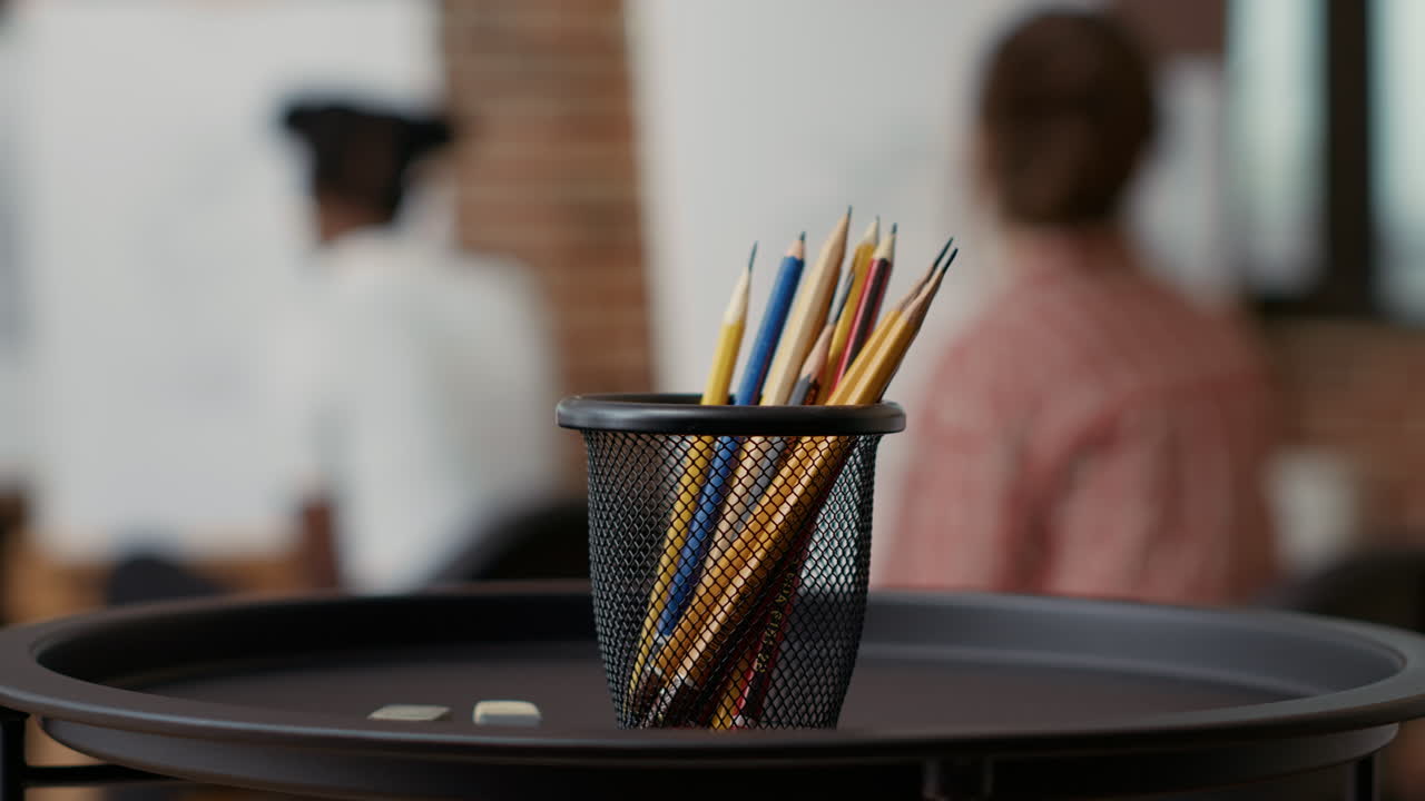 Colorful pencils and erasers on table used to draw artwork