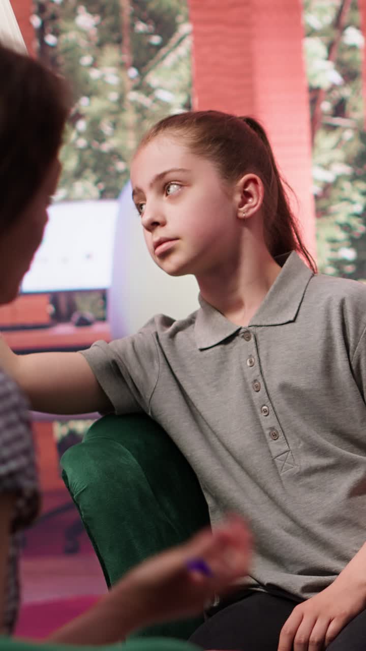 Young Girl Listening Attentively During a Counseling Session