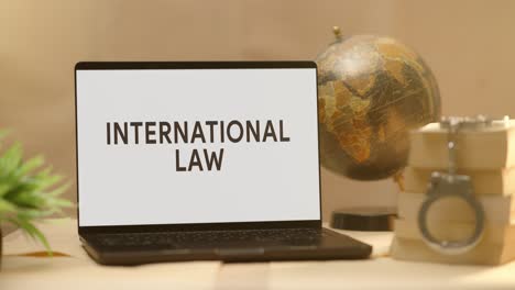 international law displayed in legal laptop screen